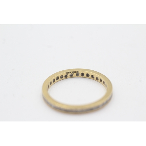 87 - 18ct gold diamond eternity ring (1.9g) Size N
