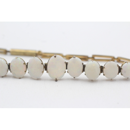 88 - 9ct gold graduated opal cabochon bracelet (4.4g)