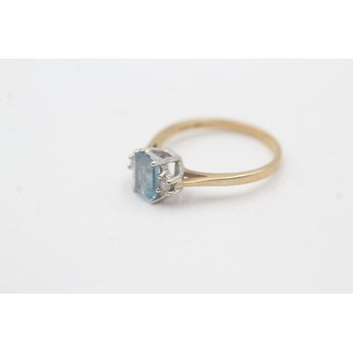 90 - 9ct gold blue topaz diamond trilogy ring (1.6g) Size K