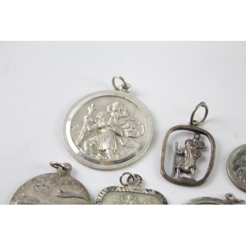 170 - Collection of Sterling Silver St Christopher Pendants inc. Georg Jensen x 7 34g