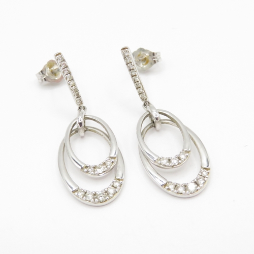 107 - 9ct white gold diamond drop earrings (3.4g)