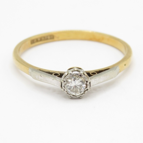 109 - 18ct gold and platinum diamond solitaire ring (2.1g) Size R