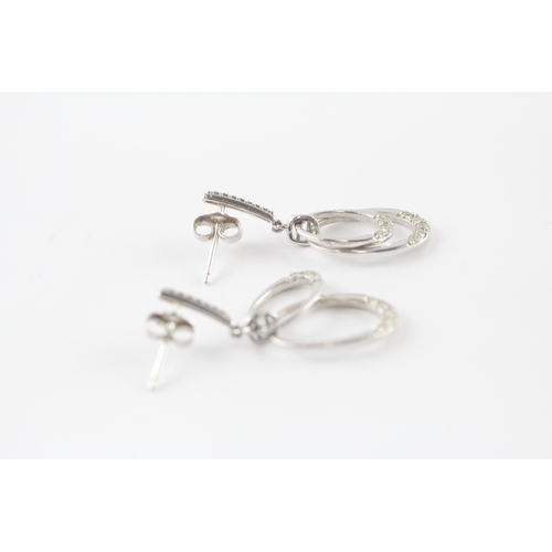 107 - 9ct white gold diamond drop earrings (3.4g)