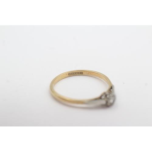 109 - 18ct gold and platinum diamond solitaire ring (2.1g) Size R