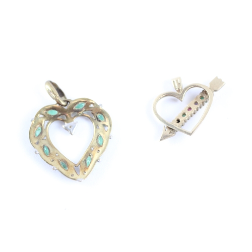 111 - 2x 9ct gold acrostic 'DEAREST' emerald diamond heart pendants (2.6g)