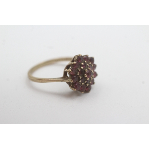 77 - 9ct gold ruby cluster ring (3.3g) Size O