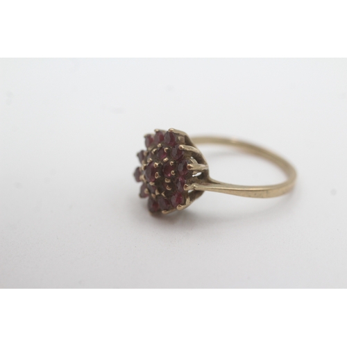 77 - 9ct gold ruby cluster ring (3.3g) Size O