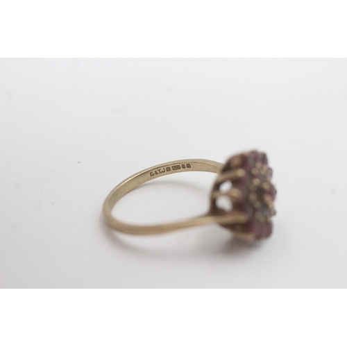 77 - 9ct gold ruby cluster ring (3.3g) Size O