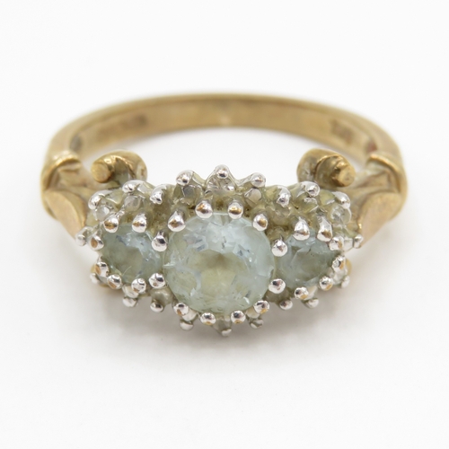 161 - 9ct gold aquamarine diamond triple cluster ring (3.1g) Size K