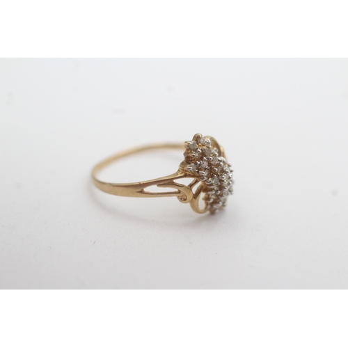 128 - 9ct gold diamond cluster ring (1.3g) Size O