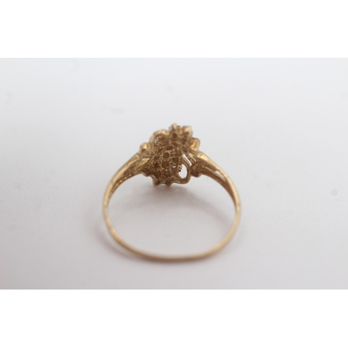 128 - 9ct gold diamond cluster ring (1.3g) Size O
