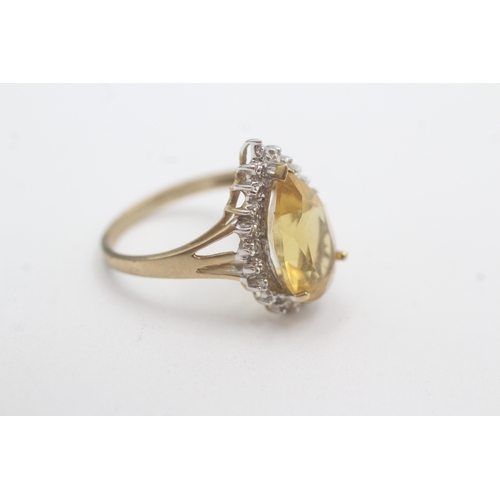 129 - 9ct gold pear cut citrine diamond cluster ring (3.5g) Size P 1/2
