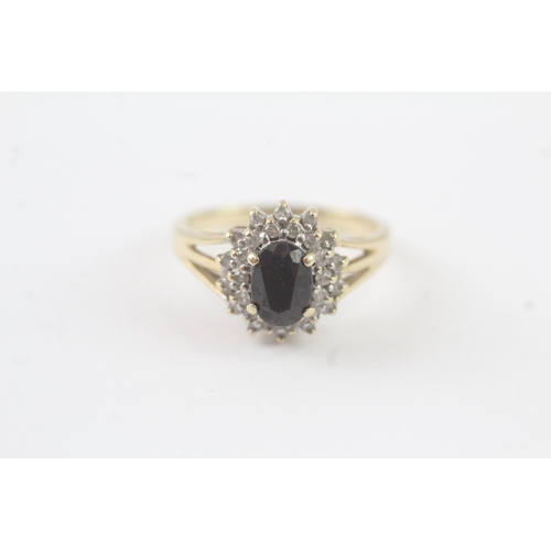143 - 9ct gold sapphire diamond cluster ring (2.6g) Size M