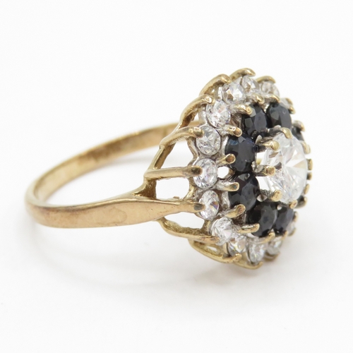 183 - 9ct gold sapphire and white gemstone dress ring  (2.8g) Size L