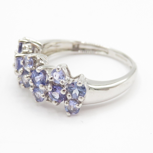 192 - 9ct gold diamond and tanzanite dress ring (3g) Size L