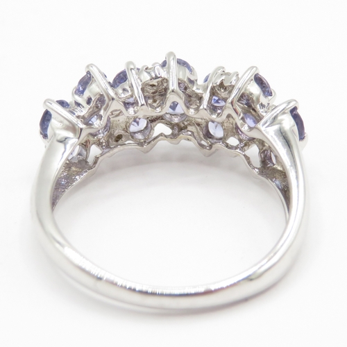 192 - 9ct gold diamond and tanzanite dress ring (3g) Size L