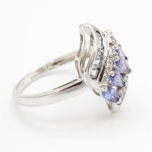 195 - 9ct gold diamond, tanzanite and gemstone dress ring (2.7g) Size P