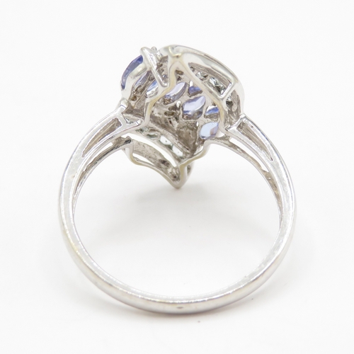 195 - 9ct gold diamond, tanzanite and gemstone dress ring (2.7g) Size P