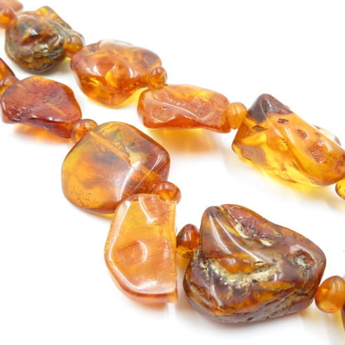 204 - 2 x Amber Necklaces (76g)
