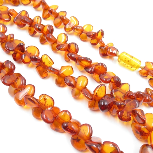 204 - 2 x Amber Necklaces (76g)