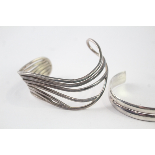213 - Collection of Sterling Silver Bangles inc. Modernist, Twist, Wave x 4 (98g)
