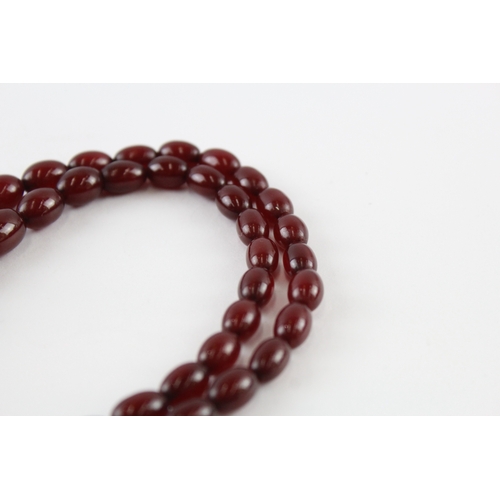 257 - Cherry Bakelite Necklace w/ Internal Streaking, Graduated (81.3g)