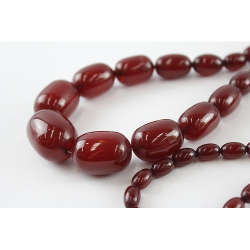 257 - Cherry Bakelite Necklace w/ Internal Streaking, Graduated (81.3g)