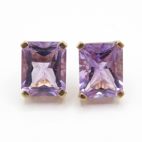 64 - 9ct gold amethyst stud earrings (2.7g)