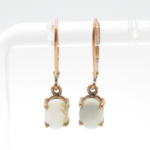 69 - 9ct gold opal drop earrings (1.8g)
