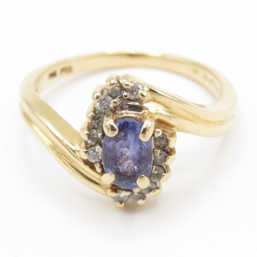 73 - 9ct gold iolite & diamond dress ring (3.2g) Size M