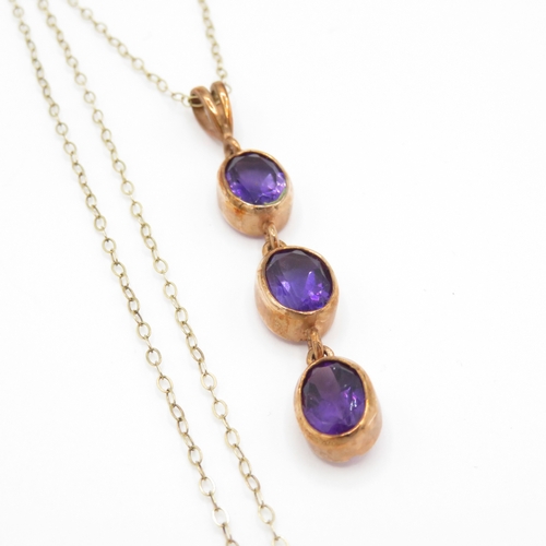 84 - 9ct gold amethyst drop pendant necklace (3.1g)