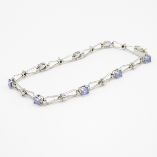 94 - 9ct gold tanzanite & diamond bracelet (3.4g)