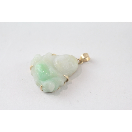 109 - 14ct gold carved Buddha jade pendant (3.6g)