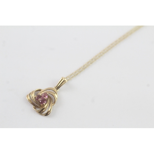 117 - 9ct gold pink sapphire pendant necklace (1.9g)