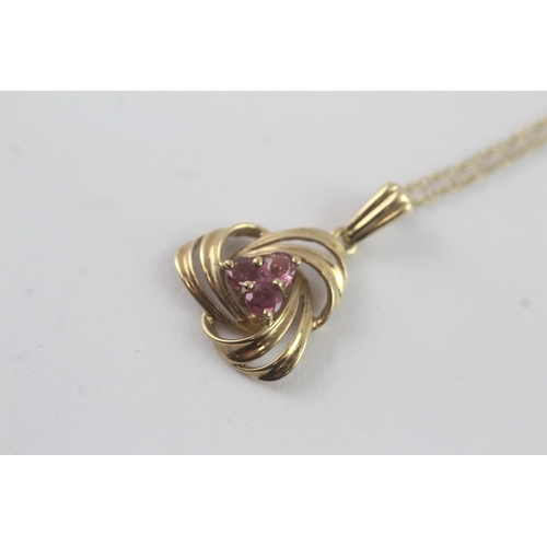 117 - 9ct gold pink sapphire pendant necklace (1.9g)