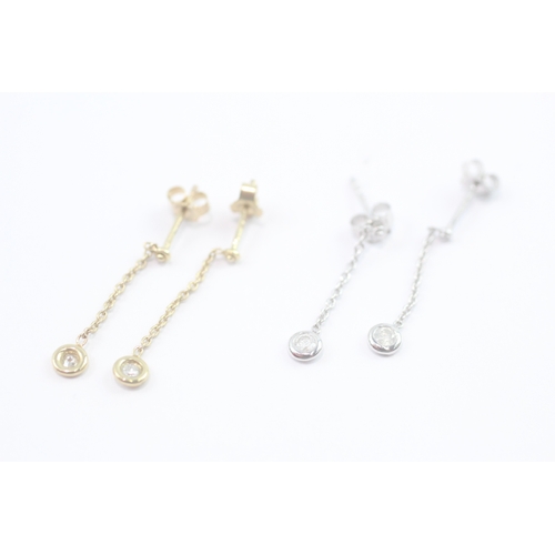 191 - 2x 9ct gold diamond drop earrings (1g)