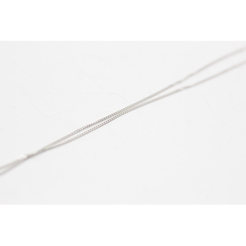 57 - 9ct gold ruby & diamond pendant necklace (2.4g)