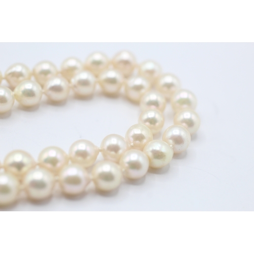 62 - 9ct gold cultured pearl necklace (29.7g)