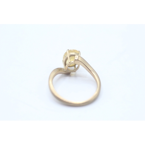 63 - 9ct gold yellow gemstone dress ring (2.2g) Size K