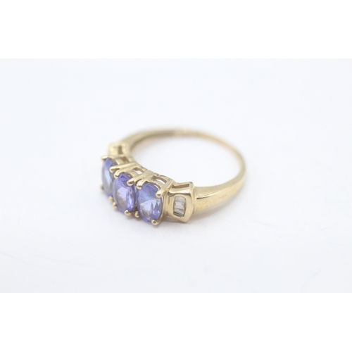 65 - 9ct gold tanzanite & diamond dress ring (2g) Size J 1/2
