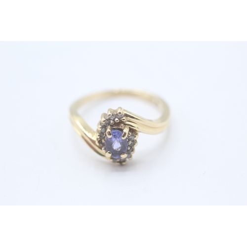 73 - 9ct gold iolite & diamond dress ring (3.2g) Size M