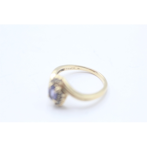 73 - 9ct gold iolite & diamond dress ring (3.2g) Size M