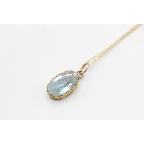 74 - 9ct gold vintage aquamarine pendant necklace (2.6g)