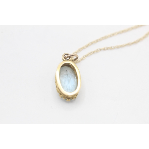 74 - 9ct gold vintage aquamarine pendant necklace (2.6g)