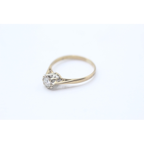 76 - 9ct gold diamond solitaire ring (1.1g) Size J 1/2