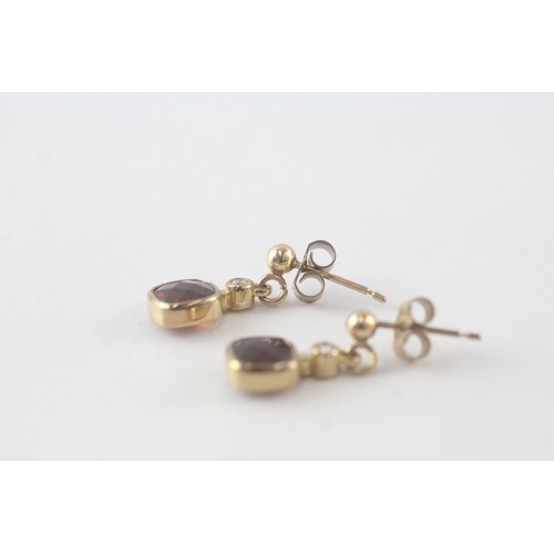 77 - 9ct gold garnet & diamond drop earrings (2.2g)