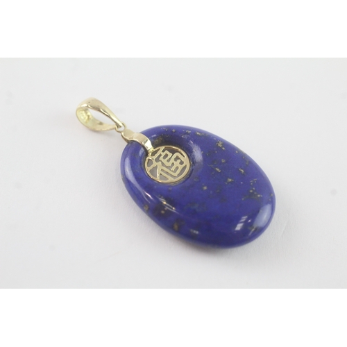 83 - 14ct gold lapis lazuli pendant (3.8g)