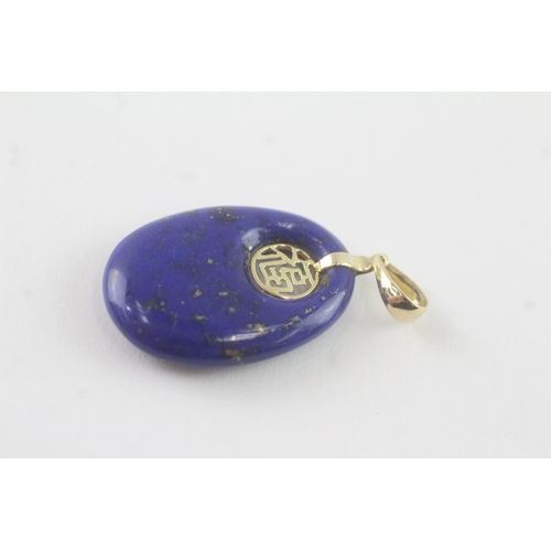 83 - 14ct gold lapis lazuli pendant (3.8g)