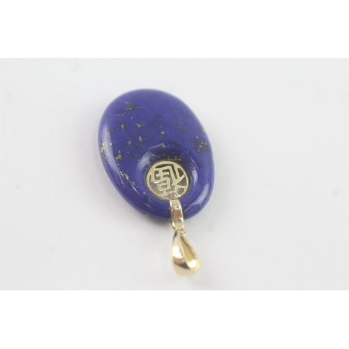 83 - 14ct gold lapis lazuli pendant (3.8g)