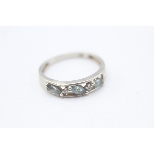88 - 9ct gold blue topaz & diamond half eternity ring (2.4g) - misshapen Size N